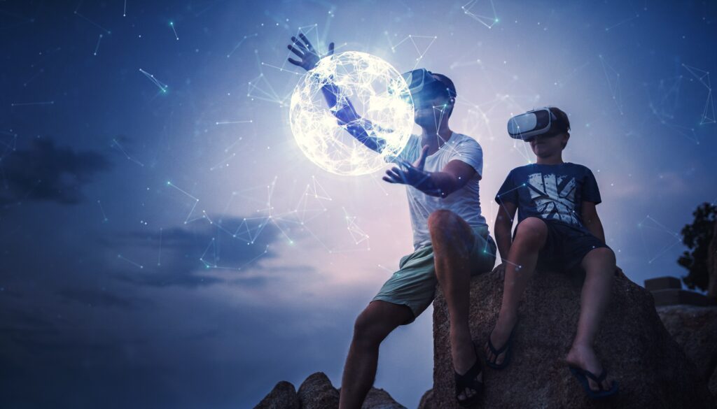 man and child with standalone virtual reality hardware