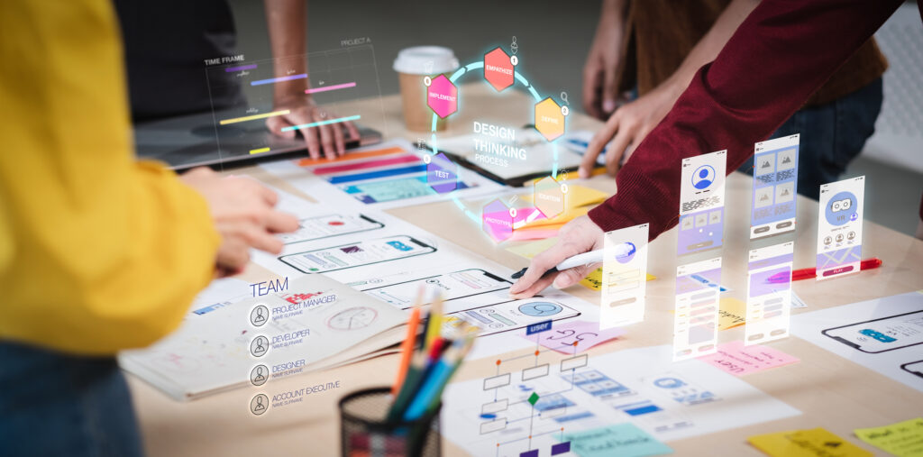 software project planning for software budget Close up ux developer and ui designer use augmented reality brainstorming about mobile app interface wireframe design on desk at modern office.Creative digital development agency